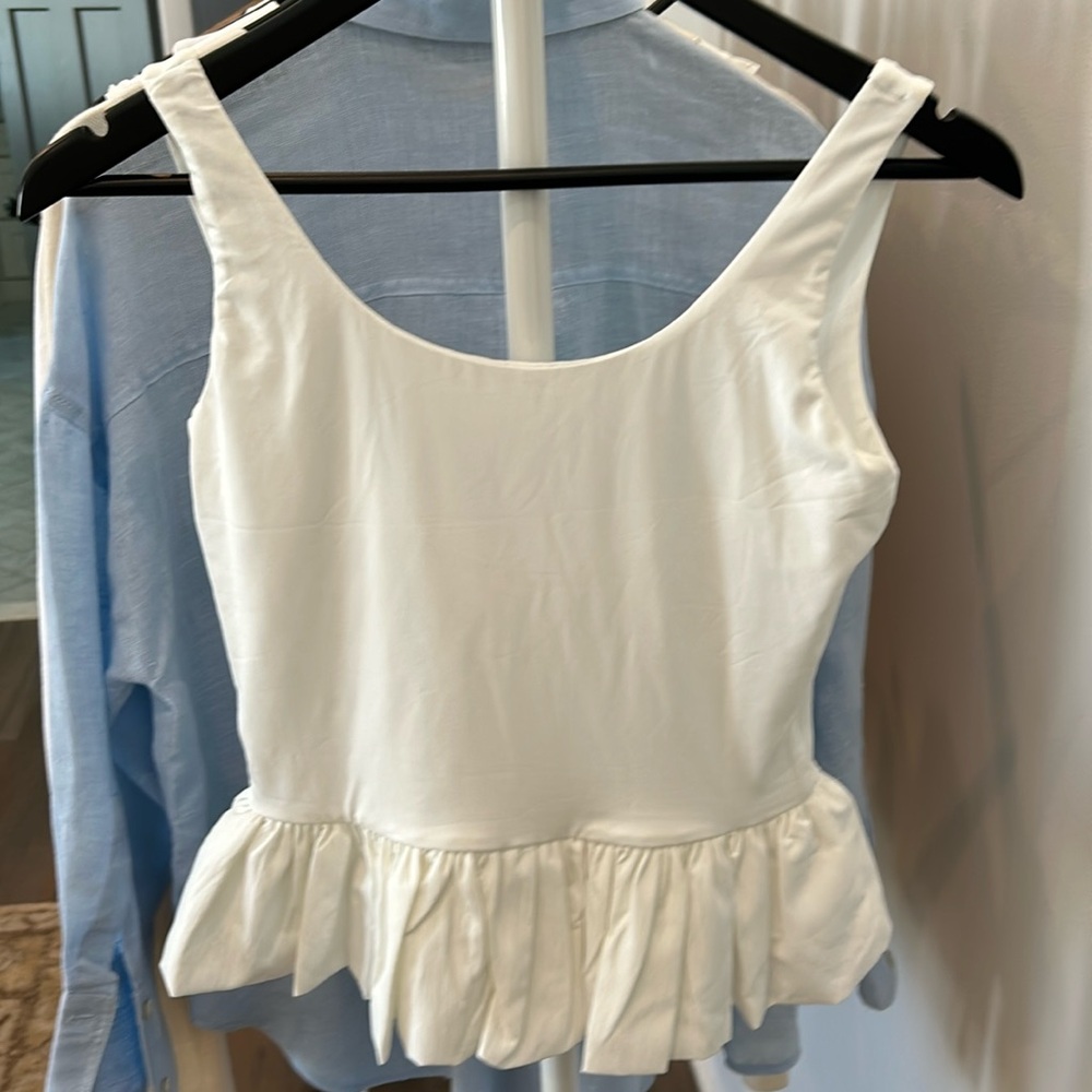 White peplum top